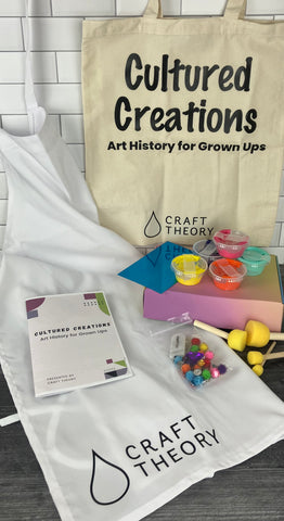 Cultured Creations subscription box supplies. Includes apron, booklet, tote bag, paint, brushes, and box.